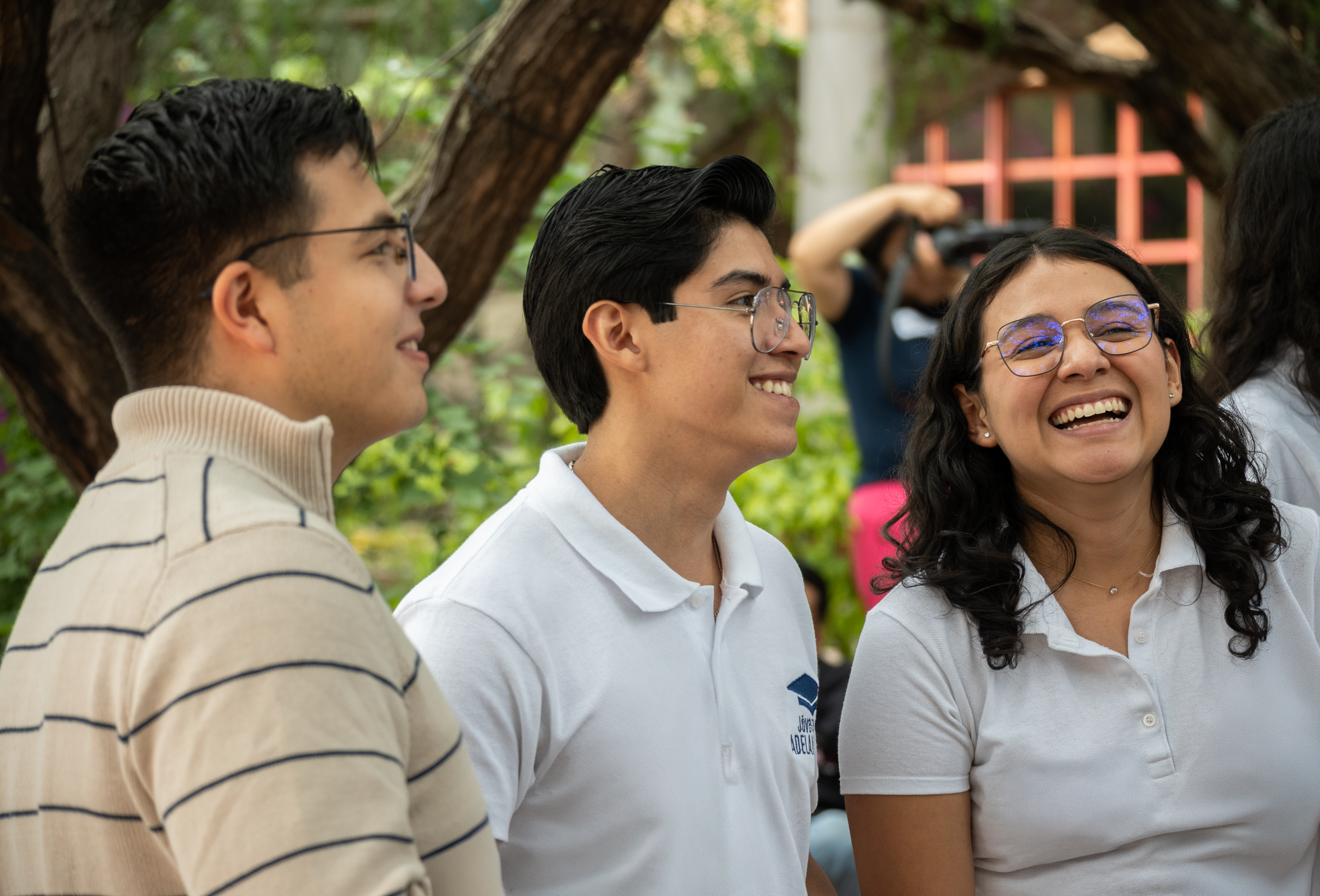 a skeleton wearing a purple hat with feathers